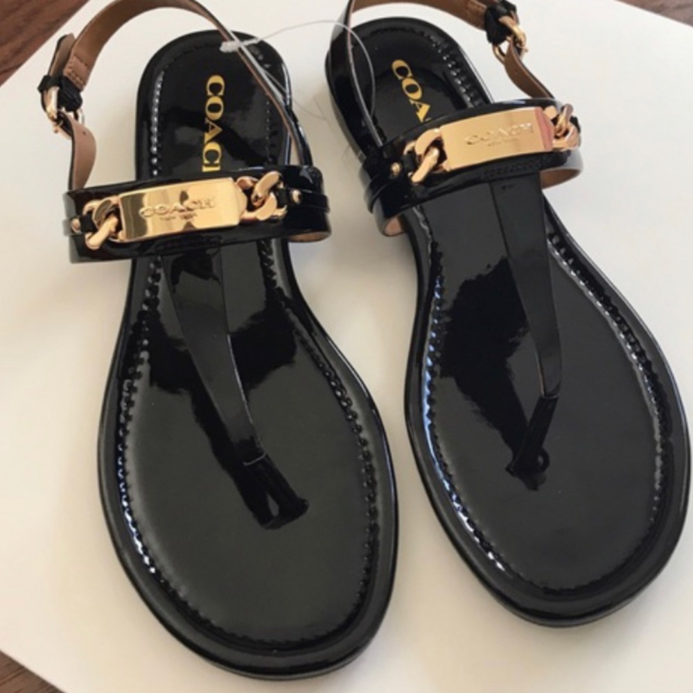 COACH women’s patten leather sandals.